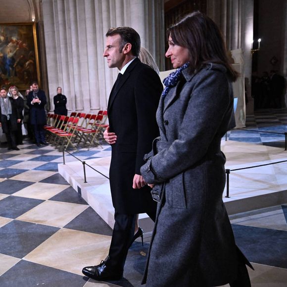 Emmanuel Macron, président de la République Française et Anne Hidalgo, maire de Paris lors de la cérémonie de réouverture de la cathédrale Notre-Dame de Paris, le 7 décembre 2024. Joyau de l’art gothique, lieu de culte et de culture, symbole universel de la France et de son histoire, la cathédrale de Notre-Dame de Paris rouvre ses portes les 7 et 8 décembre, cinq ans après le terrible incendie qui l’avait ravagée le 15 avril 2019. © Eric Tschaen/Pool/Bestimage