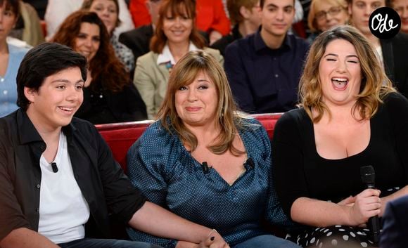 "Pendant longtemps, j’avais tellement regardé de séries avec ma fille que, quand elle s’est installée avec son mari, cela ne m’intéressait plus." 

Michele Bernier avec ses enfants Enzo et Charlotte - Enregistrement de l'emission "Vivement Dimanche" a Paris le 8 janvier 2014. L'emission sera diffusee le 12 janvier.