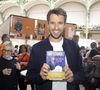 L’événement a battu un record de fréquentation, dépassant les 114 000 visiteurs de l’année précédente.

Tony Estanguet en dédicace lors du 5ème festival du Livre de Paris au Grand Palais (17 - 19 avril 2026) à Paris, le 19 avril 2026.
© Cédrice Perrin / Bestimage