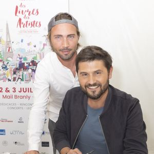 Exclusif - Ghislain Gerin et son mari Christophe Beaugrand - Festival des Livres et des Artistes organisé par l'association "Lecture pour Tous" engagée dans la lutte contre l'illettrisme au Mail Branly à Paris le2 juillet 2022.
© Pierre Perusseau/ Jack Tribeca / Bestimage