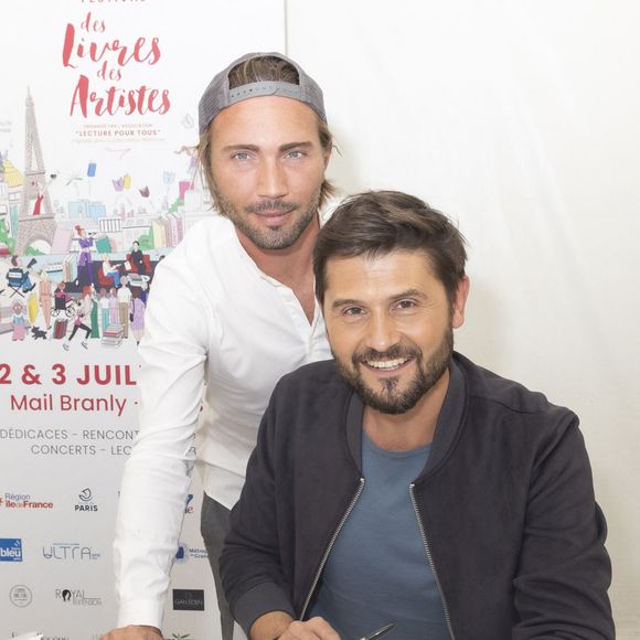 Exclusif - Ghislain Gerin et son mari Christophe Beaugrand - Festival des Livres et des Artistes organisé par l'association "Lecture pour Tous" engagée dans la lutte contre l'illettrisme au Mail Branly à Paris le2 juillet 2022.
© Pierre Perusseau/ Jack Tribeca / Bestimage