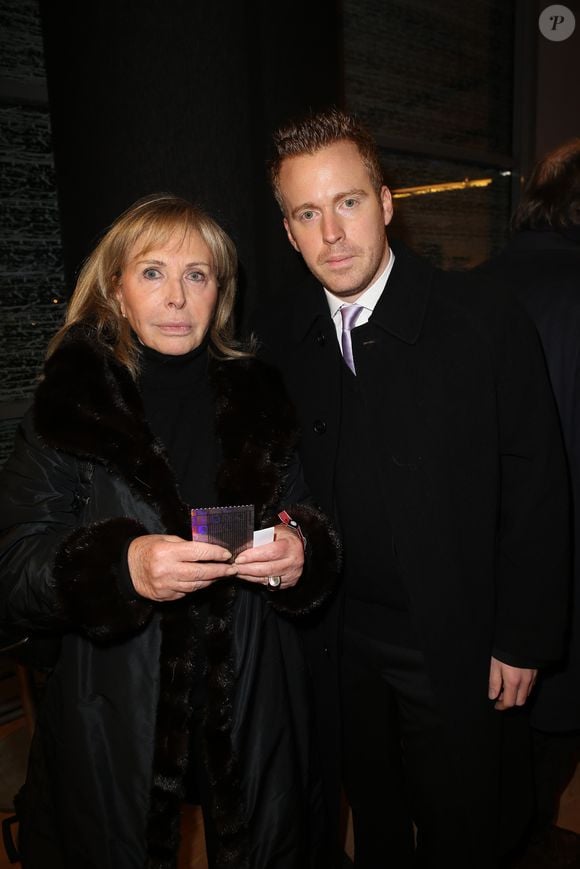 Francoise (la femme de Thierry Roland) et son fils Gary Roland - Inauguration de la tribune de presse Thierry Roland au Stade de France a Saint Denis a l'occasion de la rencontre amicale France-Allemagne le 6 Fevrier 2013.  © Cyril Moreau Bestimage