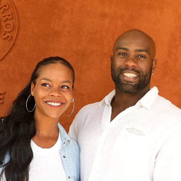 Teddy Riner et sa femme Luthna Plocus au village lors des internationaux de France Roland Garros à Paris le 13 juin 2021.

© Dominique Jacovides / Bestimage