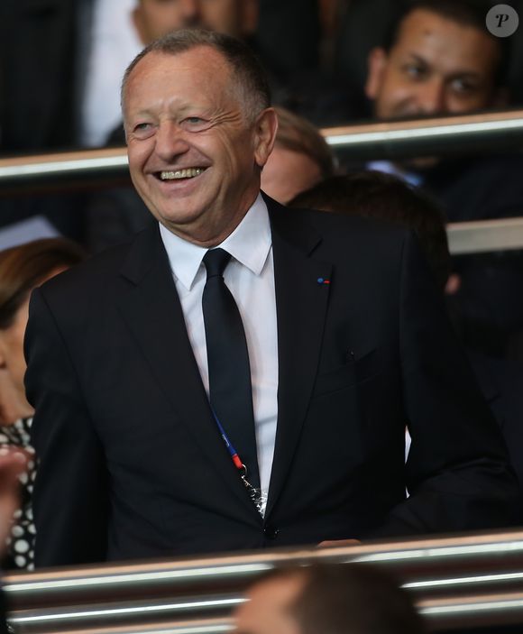 Et bien sûr un entrepreneur redoutable. 

Jean-Michel Aulas - People assistent au match de football entre le Psg et Lyon au Parc des Princes à Paris le 21 septembre 2014.