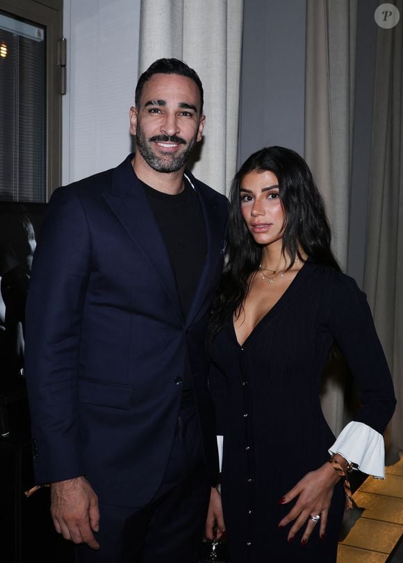 Adil Rami et sa compagne Louana Franco - Vernissage de l'exposition photos et du livre "La Boxe fait son cinéma" à l’hôtel Brach à Paris le 23 Septembre 2025. © Denis Guignebourg/Bestimage