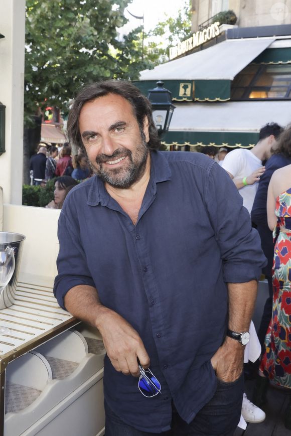 Qui n'est autre que la mère de deux de ses enfants : Anton et Aris

André Manoukian lors de la soirée de l'été littéraire et musical aux Deux Magots à Paris. © Jack Tribeca / Bestimage