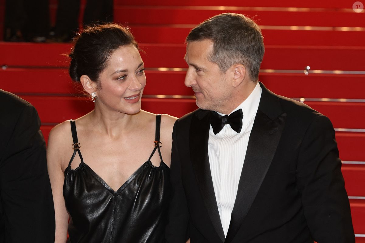 Photo : Marion Cotillard et Guillaume Canet - Descente des marches du ...