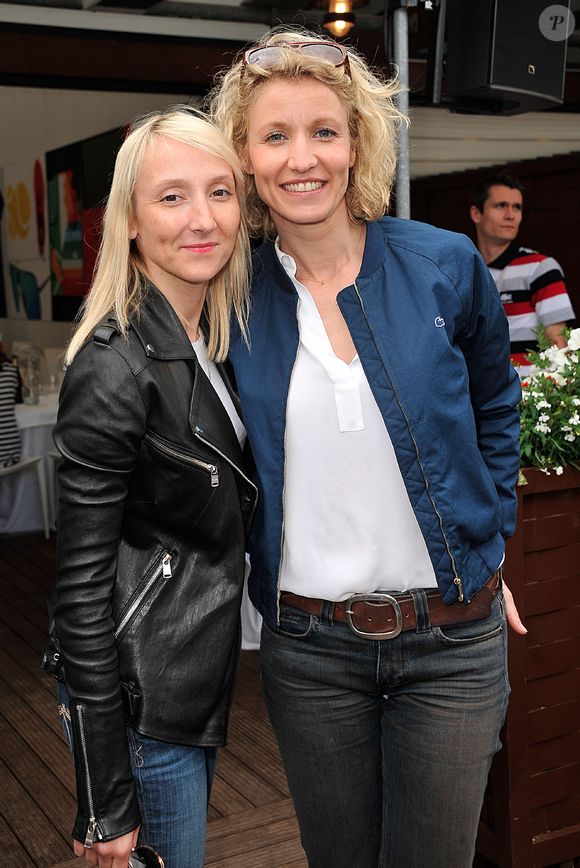 Audrey et Alexandra Lamy au Village lors des Internationaux de France de tennis de Roland Garros, le 2 juin 2013.

Photo : Jacovides / Agence / Bestimage