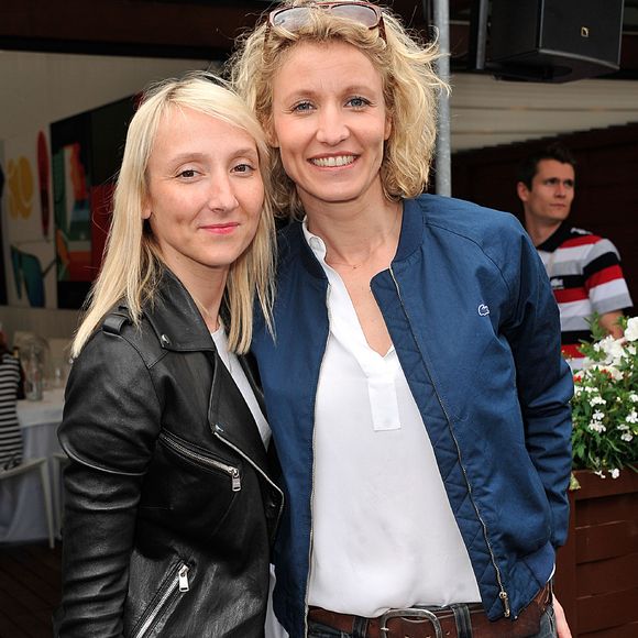 Audrey et Alexandra Lamy au Village lors des Internationaux de France de tennis de Roland Garros, le 2 juin 2013.

Photo : Jacovides / Agence / Bestimage