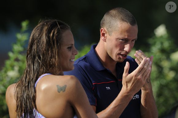 Laure Manaudou et Frédérick Bousquet à l'Open de France EDF à Paris, le 25 juin 2011. 

Photo : Henri Szwarc / Abaca