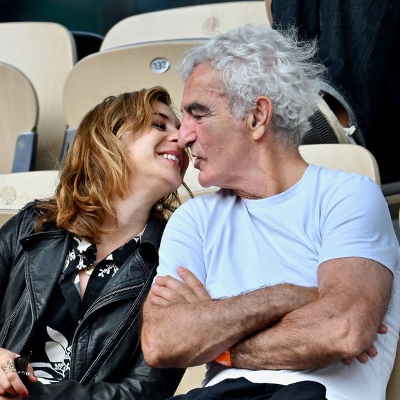 Raymond Domenech et sa nouvelle compagne à Roland Garros à Paris, France. Photo ABACAPRESS.COM