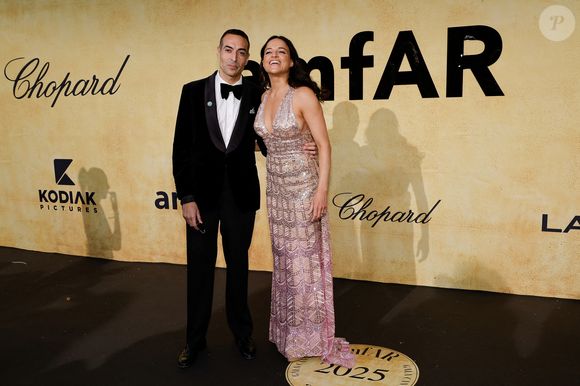 Mohammed Al Turki et Michelle Rodriguez au photocall du gala AmFar 2025 by Chopard à l'Hôtel du Cap-Eden-Roc à Antibes le 22 mai 2025.

© Moreau / Jacovides / Bestimage