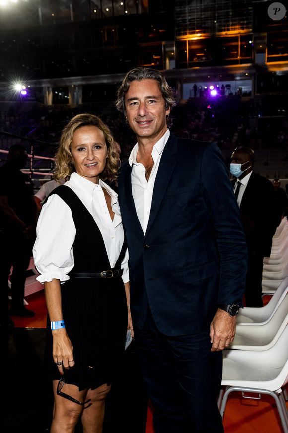 Laurent Solly et sa compagne Caroline Roux - People et politiques se retrouvent au gala de boxe "La Conquête" au stade Roland Garros à Paris le 10 septembre 2021

© JB Autissier / Panoramic / Bestimage