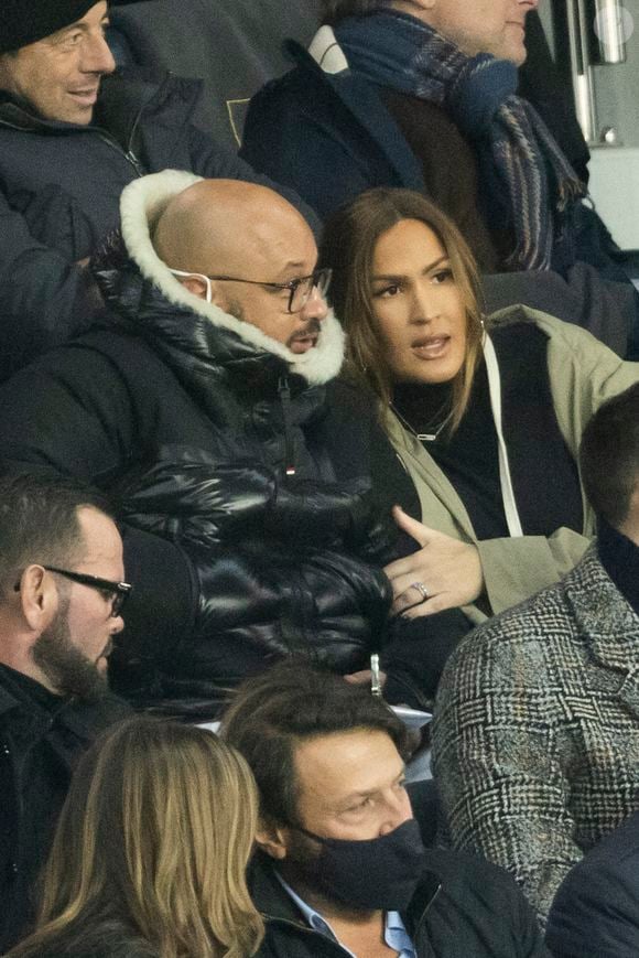 Vitaa (enceinte de son 3ème enfant) et son mari Hicham Bendaoud - People lors de la huitième de finale aller de la Ligue des champions entre le PSG et le Real Madrid au Parc des Princes à Paris le 15 février 2022. © Cyril Moreau/Bestimage