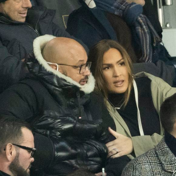 Vitaa (enceinte de son 3ème enfant) et son mari Hicham Bendaoud - People lors de la huitième de finale aller de la Ligue des champions entre le PSG et le Real Madrid au Parc des Princes à Paris le 15 février 2022. © Cyril Moreau/Bestimage