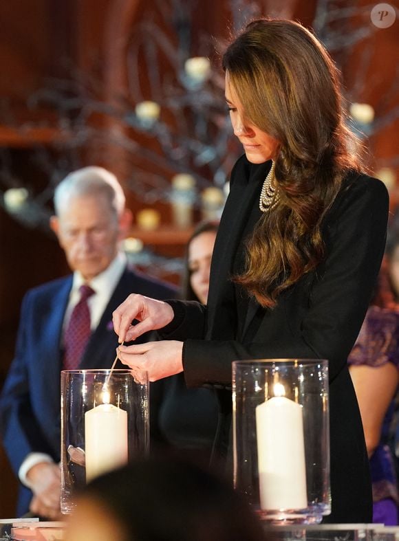 Le prince William, prince de Galles, et Catherine (Kate) Middleton, princesse de Galles, assistent à une cérémonie de commémoration des 80 ans de la libération du camp de concentration d'Auschwitz-Birkenau au Guildhall à Londres, le 26 janvier 2025.