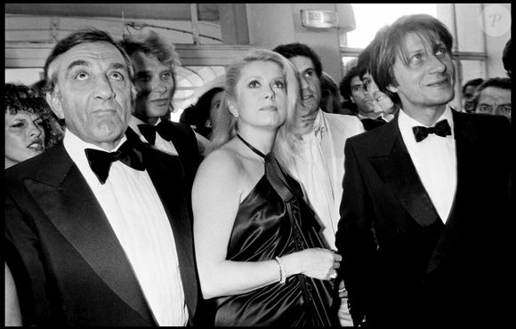 Lino Ventura, Johnny Hallyday, Catherine Deneuve et Jacques Dutronc lors de la soirée de clôture du Festival de Cannes en 1979. © Bestimage