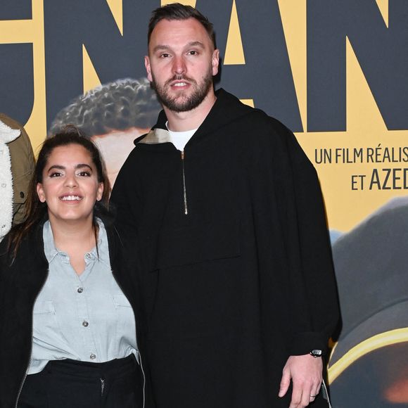Inès Reg et Kevin Debonne à l'avant-première du film "Les Gagnants" au Grand Rex à Paris, le 11 avril 2022. 

Photo : Coadic Guirec / Bestimage
