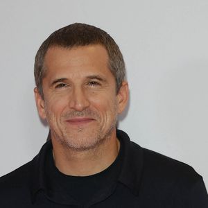Le comédien et réalisateur confie : « Sans mes deux merveilleux enfants, je pense que j'aurais pu lâcher », soulignant ainsi le rôle déterminant de sa famille dans les moments difficiles.

Guillaume Canet (réalisateur du film "Karma") au photocall de la première du film "Karma" au cinéma Pathé Palace à Paris le 13 octobre 2026. © Coadic Guirec / Bestimage