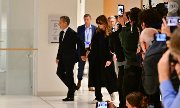 Nicolas Sarkozy et sa femme Carla Bruni au Tribunal judiciaire (Batignolles, 32ème chambre correctionnelle) pour l'annonce de la décision dans le cadre du procès Lybien le 25 septembre 2025. © Christian Liewig / Bestimage