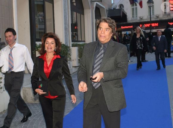 L'homme d'affaires Bernard Tapie et sa femme assistent à la soirée de réouverture du célèbre cabaret 'Bobino' à Paris, France, le 26 mars 2007. Photo by Benoit Pinguet/ABACAPRESS.COM