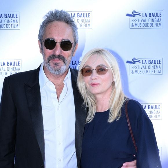 Elle a accompagné ce tendre souvenir de quelques mots : "Huit ans déjà et pour la vie."

Emmanuelle Béart (prix d'honneur) et son mari Frédéric Chaudier - 12ème édition festival des musiques de films de La Baule le 28 juin 2026. © Rachid Bellak/Bestimage