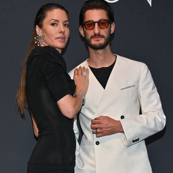 Natasha Andrews, Pierre Niney lors du dîner Kering Women In Motion au 78ème Festival de Cannes à Cannes, France, le 18 mai 2025. Photo by Julien Reynaud/APS-Medias/ABACAPRESS.COM