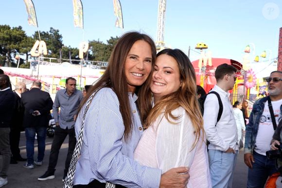 Nathalie Marquay Pernaut avec sa fille Lou Pernaut - Inauguration de la Foire du Trône 2025 à Paris le 4 avril 2025. © Cédric Perrin/Bestimage