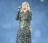La chanteuse Louane (Louane Emera), représentante de la France au concours de l'Eurovision, interpréte pour la première fois son titre "maman", en hommage à sa mère décédée lorsqu'elle avait 17 ans, devant les 80 000 spectateurs, suspendue sur une plateforme, plusieurs mètres au-dessus de la pelouse et des musiciens, du Stade de France à la mi-temps du match du Tournoi des Six Nations opposant la France à l'Écosse, à Saint-Denis, Seine Saint-Denis, France, le 15 mars 2025. © Cyril Moreau/Bestimage