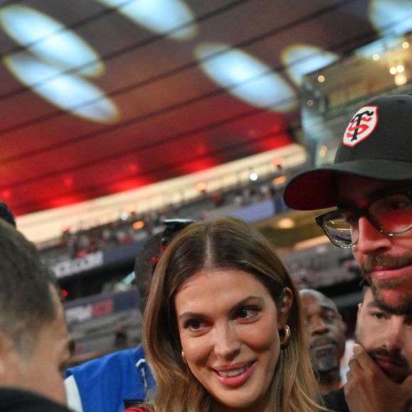 Iris Mittenaere et Antoine Dupont - Victoire des Toulousains en finale du Top 14, face à Montpellier (28 - 20) au stade de France, le 27 juin 2026. 
© Christian Liewig / Bestimage