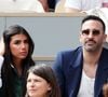 Adil Rami et sa compagne Louana Franco dans les tribunes lors des Internationaux de France de Tennis de Roland Garros. Paris. © Dominique Jacovides/Bestimage