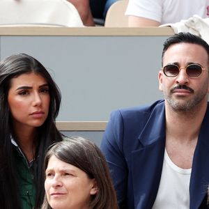 Adil Rami et sa compagne Louana Franco dans les tribunes lors des Internationaux de France de Tennis de Roland Garros. Paris. © Dominique Jacovides/Bestimage