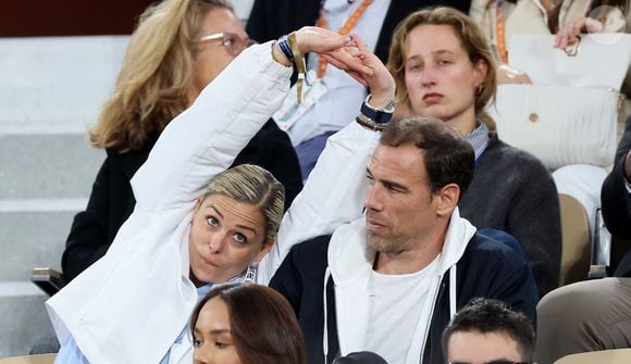 Laure Boulleau et Bruno Cheyrou dans les tribunes lors des Internationaux de France de Tennis de Roland Garros 2025, à Paris, France, le 28 mai 2025. © Jacovides-Moreau/Bestimage