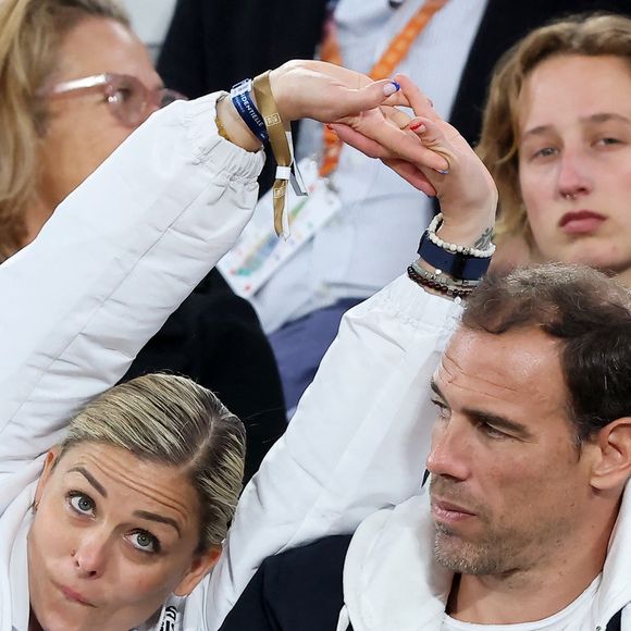 Laure Boulleau et Bruno Cheyrou dans les tribunes lors des Internationaux de France de Tennis de Roland Garros 2025, à Paris, France, le 28 mai 2025. © Jacovides-Moreau/Bestimage