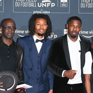 Lilian Thuram avec ses fils Khephren Thuram, Marcus Thuram, guest - Photocall de la cérémonie des Trophées UNFP 2022 au Pavillon Gabriel à Paris le 15 mai 2022. © Coadic Guirec/Bestimage
