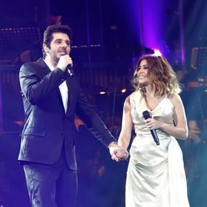 Malgré leur rupture, Julie Zenatti assure que leur relation n’a jamais laissé place à l’amertume. Elle parle de Patrick avec beaucoup de tendresse et de respect.
Patrick Fiori et Julie Zenatti – Notre-Dame de Paris – concert hommage avec la participation de 70 musiciens et 40 choristes au Palais Omnisports de Paris Bercy à Paris, France le 18 décembre 2011. © Guillaume Gaffiot /Bestimage