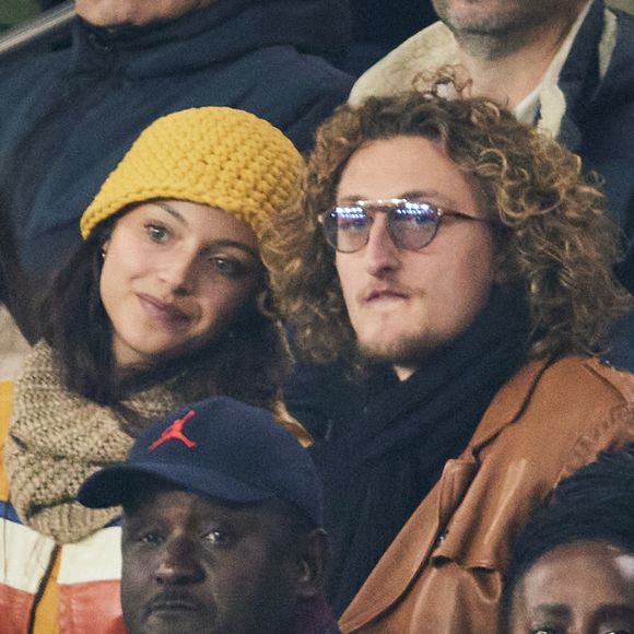 Les enfants de Yannick Noah étaient au Parc des Princes pour assister au classique entre Paris et Marseille

Jenaye Noah et son frère Joalukas Noah, Raphaël Quenard - Célébrités dans les tribunes lors du match de Ligue 1 McDonald's opposant le Paris Saint-Germain (PSG) à l'Olympique de Marseille (OM) - (3-1) au Parc des Princes à Paris le 16 mars 2025. © Cyril Moreau/Bestimage