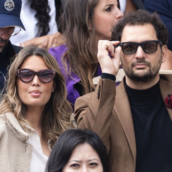 Éric Antoine et sa compagne Gennifer Demey au village lors des Internationaux de France de Tennis de Roland Garros 2025, à Paris, France, le 7 juin 2025. © Cyril Moreau/Bestimage