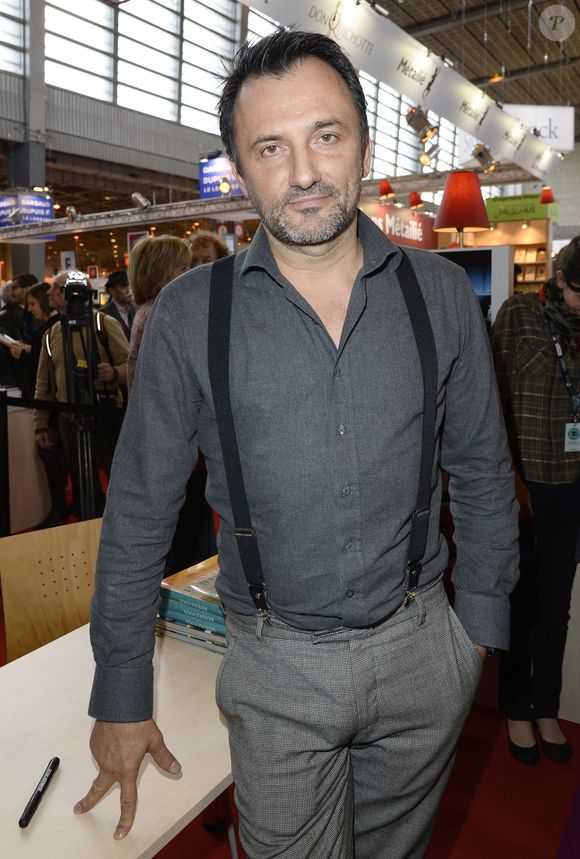 Frédéric Lopez lors du 34ème édition du Salon du Livre à Paris Porte de Versailles le 22 mars 2014. Crédit Coadic Guirec / Bestimage