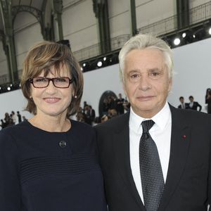 Michel Sardou se livre sur son couple avec Anne-Marie Périer.

Michel Sardou et son épouse Anne-Marie Périer assistent au défilé de la collection prêt-à-porter printemps-été de Chanel qui s'est tenu au Grand Palais à Paris, France. Photo Thierry Orban/Abaca