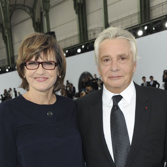 Michel Sardou se livre sur son couple avec Anne-Marie Périer.

Michel Sardou et son épouse Anne-Marie Périer assistent au défilé de la collection prêt-à-porter printemps-été de Chanel qui s'est tenu au Grand Palais à Paris, France. Photo Thierry Orban/Abaca