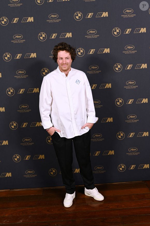 Exclusif - Jean Imbert - Photocall du dîner organisé par BMW, suivi d’un concert de Orelsan sur la plage de l’hôtel Martinez en marge du 76ème Festival International du Film de Cannes, France, le 18 mai 2023. Le chef J.Imbert sera présent pour préparer un menu gastronomique pour les invités VIP de BMW. Orelsan, le célèbre rappeur français, mettra le feu sur la scène avec ses tubes les plus connus, créant une atmosphère électrisante pour tous les festivaliers présents. © Rachid Bellak/Bestimage