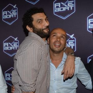 Eric Judor et Ramzy Bedia - Soirée Axe Boat a cote du Palais des Festivals dans le port de Cannes, le 3 aout 2013.  
Crédit : RACHID BELLAK / BESTIMAGE