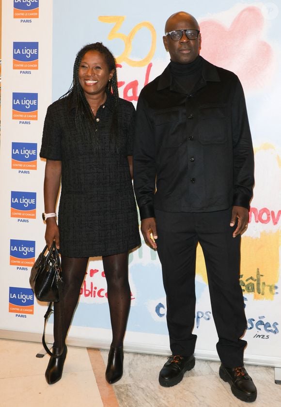 Lilian Thuram et sa femme Kareen Guiock-Thuram - Photocall du 30ème Gala de l’Espoir donné au profit de la recherche contre le cancer au théâtre des Champs-Elysées à Paris le 18 novembre 2024. © Coadic Guirec/Bestimage