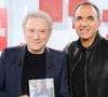 La première mettra à l’honneur Nikos Aliagas et son exposition Les Grands Âges.

 Nikos Aliagas et Michel Drucker lors de l'enregistrement de l'émission « Vivement dimanche » au studio Rive Gauche, présentée par M. Drucker, diffusée sur France 3 le 21 juin 2026, à Paris, France, le 20 mai 2026. © Guillaume Gaffiot/Bestimage