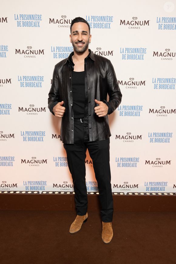 Adil Rami - Photocall de la soirée du film "La Prisonnière de Bordeaux" sur la plage Magnum lors du 77ème Festival International du Film de Cannes, France, le 18 mai 2024. © Jeremy Melloul / Magnum Cannes via Bestimage