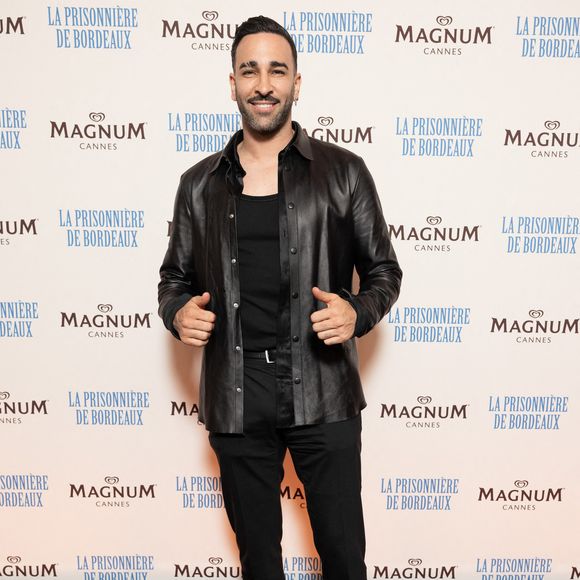 Adil Rami - Photocall de la soirée du film "La Prisonnière de Bordeaux" sur la plage Magnum lors du 77ème Festival International du Film de Cannes, France, le 18 mai 2024. © Jeremy Melloul / Magnum Cannes via Bestimage