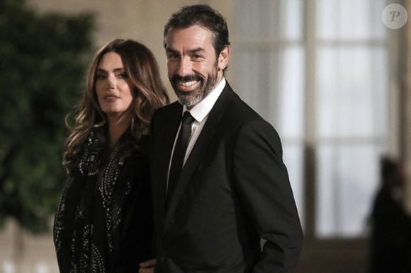 L'ancien joueur de football français Robert Pires et sa femme Jessica - Dîner au Palais de l'Elysée en l'honneur des 50 ans du Variétés Club de France, à Paris, le 14 octobre 2021. © Stéphane Lemouton / Bestimage