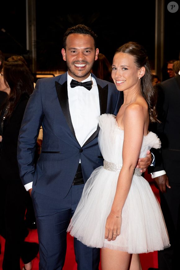 Mohamed Bouhafsi et sa compagne - Montée des marches du film "Novembre" lors du 75ème Festival International du Film de Cannes, le 22 mai 2022. © Cyril Moreau / Bestimage