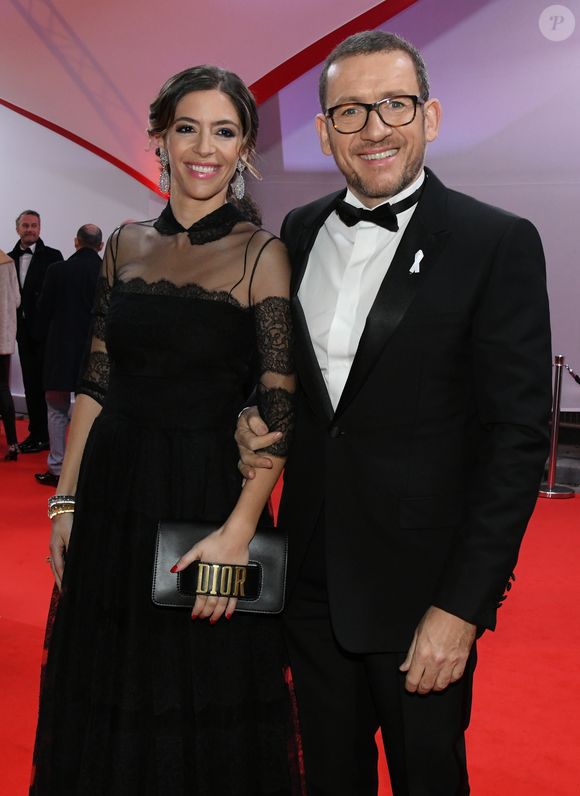 Exclusif - Dany Boon (porte le ruban blanc "Maintenant on agit" ) et sa femme Yael -  Arrivées lors de la 43ème cérémonie des Cesar à la salle Pleyel à Paris, le 2 mars 2018.
© Stephane Kossman / Bestimage